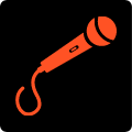 Pomarańczowo-czerwony mikrofon na czarnym tle.