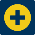 Żółte koło z wydrążonym krzyżem w środku, symbolizujące zastosowanie medyczne.